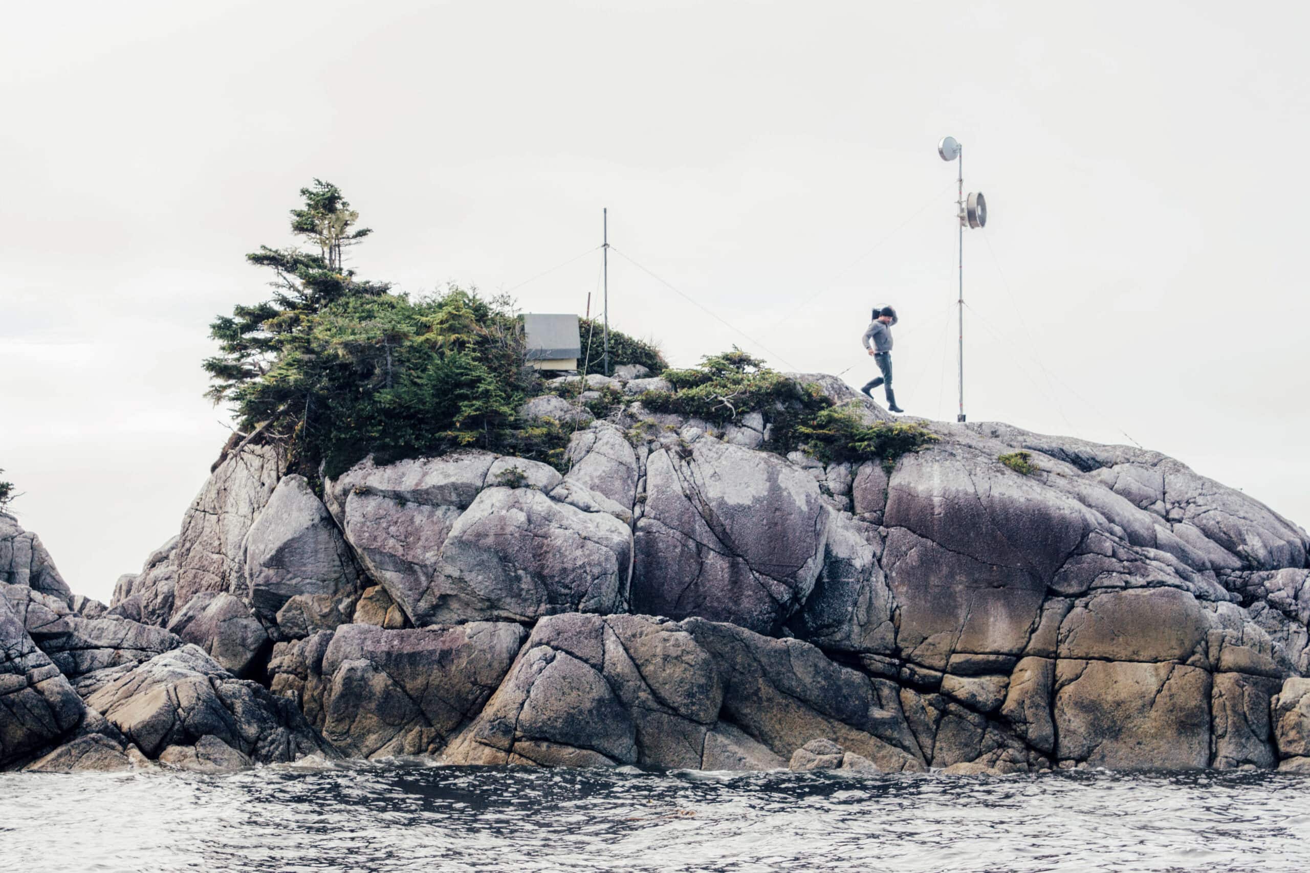 Max Bakken, pictured installing field equipment, says part of Pacific Wild’s appeal was the freedom it offered — but he also witnessed verbal harassment and “irresponsible seamanship.” Photo: Peter Thicke.