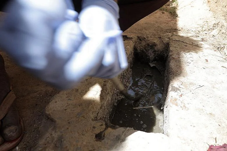 A latrine chamber being cleared out in a Bangalore neighbourhood. Photo: Arvind Dev.